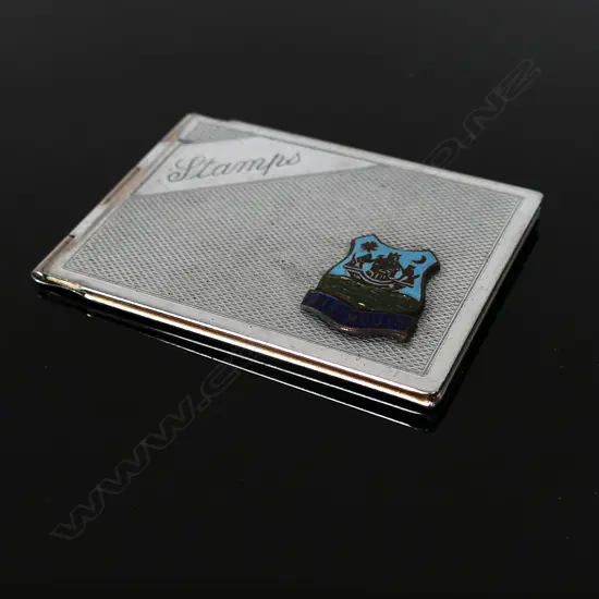 Chromium Plated Stamp Case marked “Stamps and Coat of Arms Badge “DARTMOUTH”