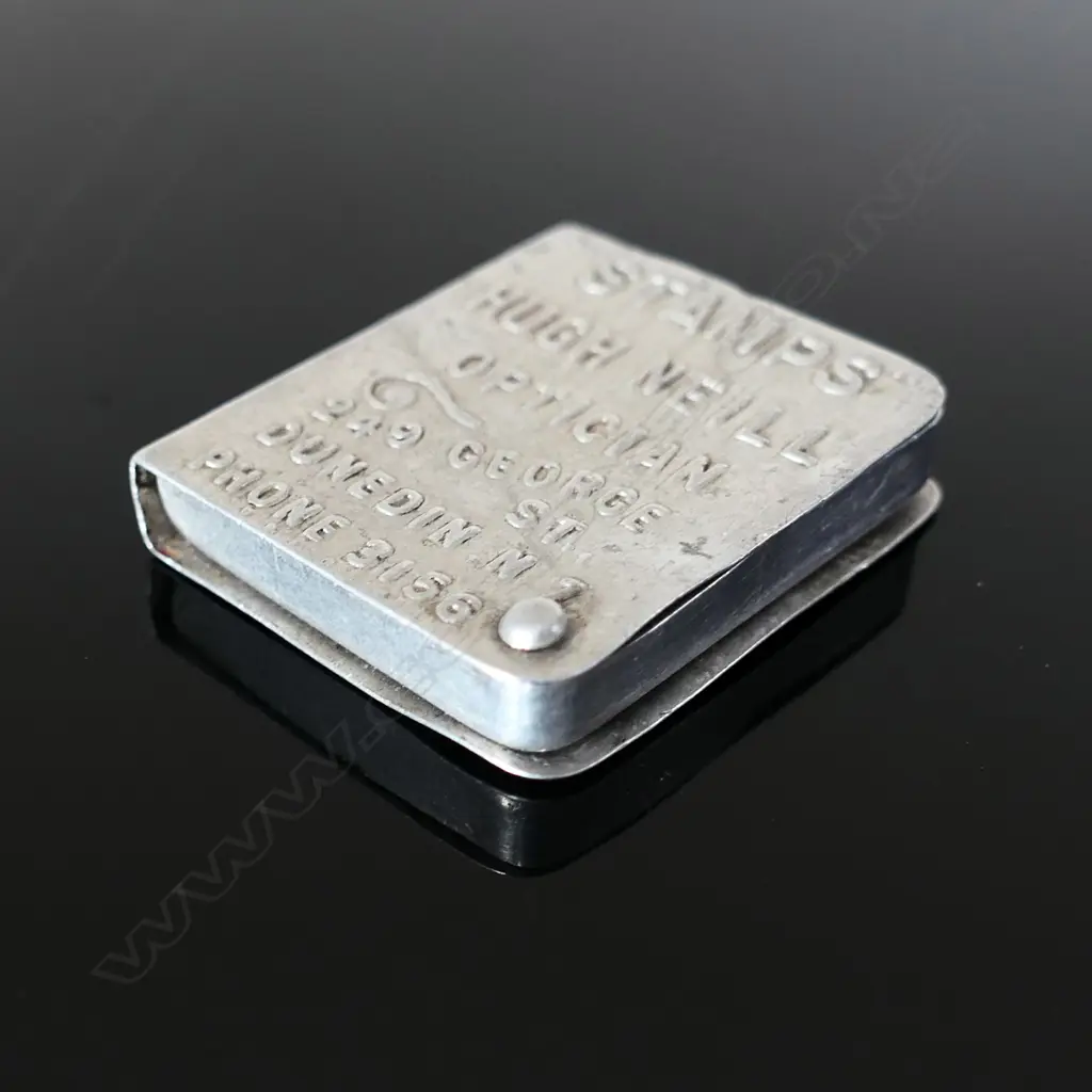 NZ Advertising Aluminium Stamp Case, with the outer embossed with the firm’s details. Image 1++