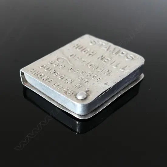 NZ Advertising Aluminium Stamp Case, with the outer embossed with the firm’s details.