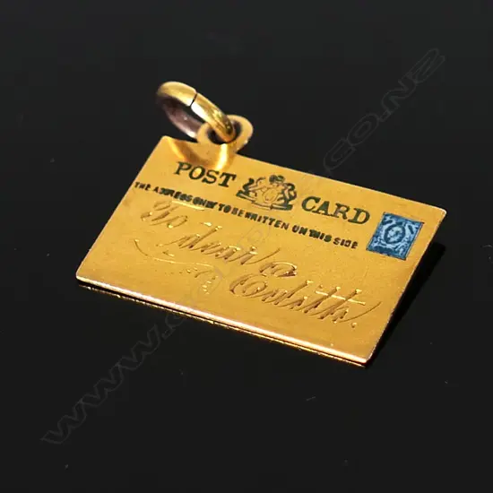 Unmarked Gold Bracelet Charm modelled as a postcard,