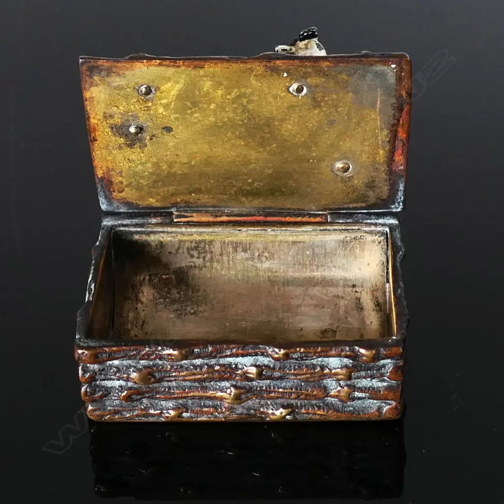 Brass Novelty Single Stamp Box, with naturalistic log surfaces surmounted by a painted  small terrier dog affixed to the top hinged lid. Image 1++
