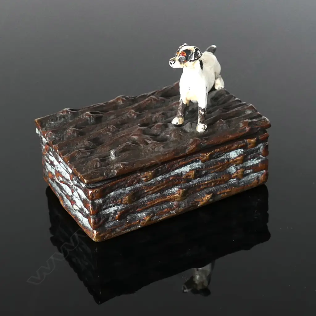 Brass Novelty Single Stamp Box, with naturalistic log surfaces surmounted by a painted  small terrier dog affixed to the top hinged lid. Image 1++