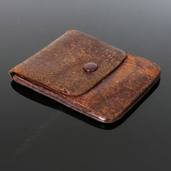 Brown Leather Purse with a loose leather insert (pulls out to expose six Postage Stamp Compartments)