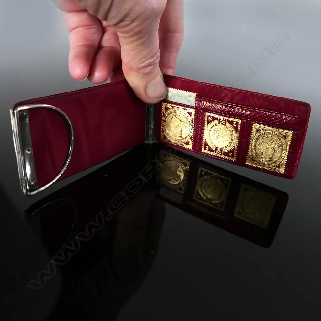 Leather Silver and Red Leather Case with three stamp compartments. Image 1++