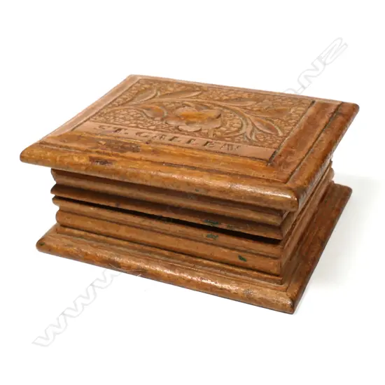 Wooden Single Stamp Box with a top carved with a floral motif, and “ST. GALLEN"