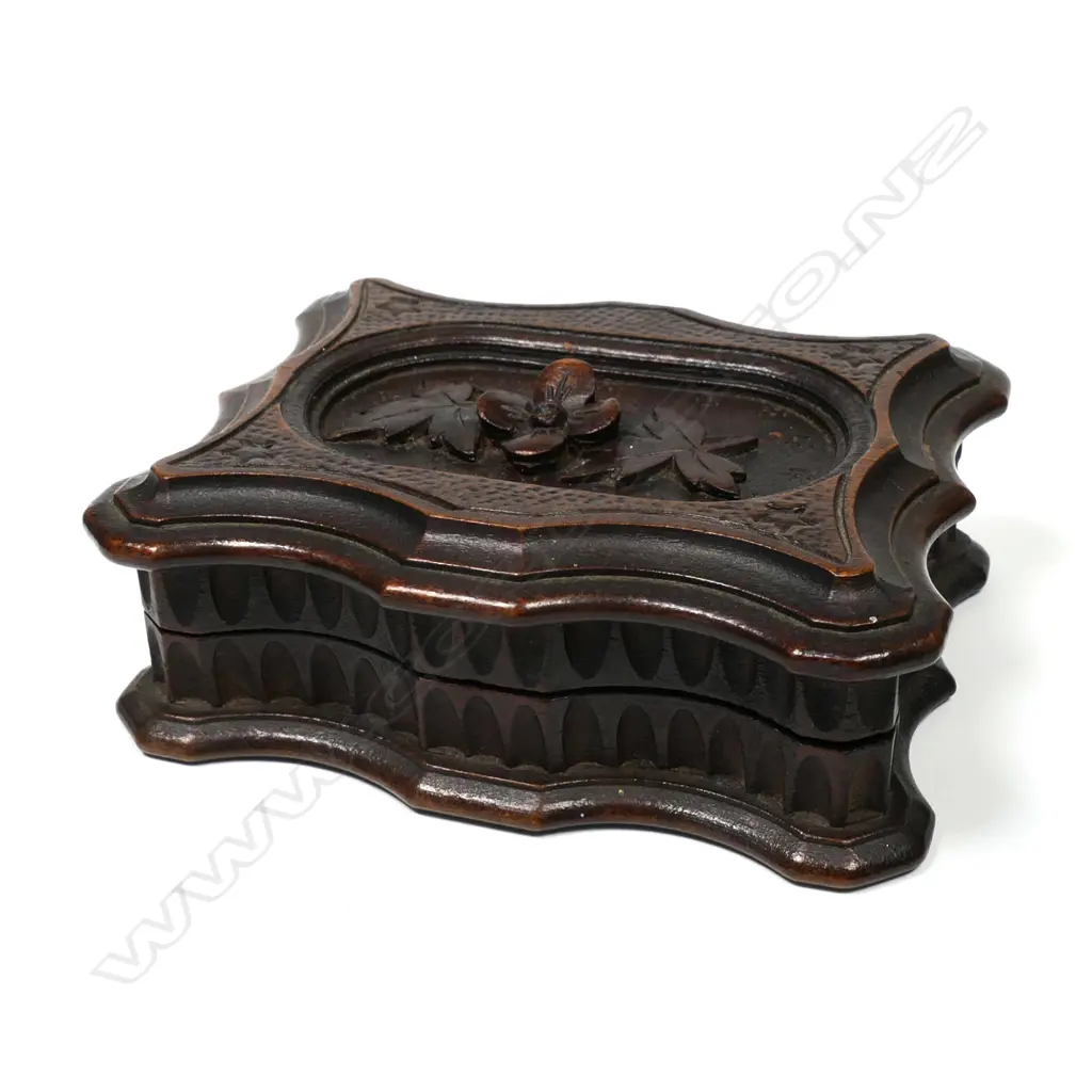 Wooden ‘Shaped’ Double Stamp Box with a secret hinged top carved with a floral motif. Image 1++