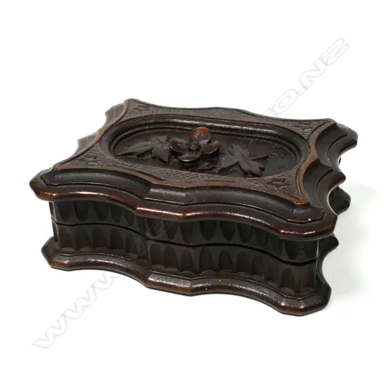 Wooden ‘Shaped’ Double Stamp Box with a secret hinged top carved with a floral motif.