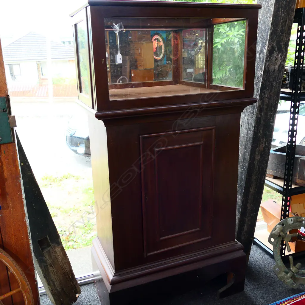MAHOGANY DISPLAY VITRINE ON PANELLED PEDESTAL BASE w CUPBOARD ENCLOSING 2 SHELVES. H.1490mm Image 1++