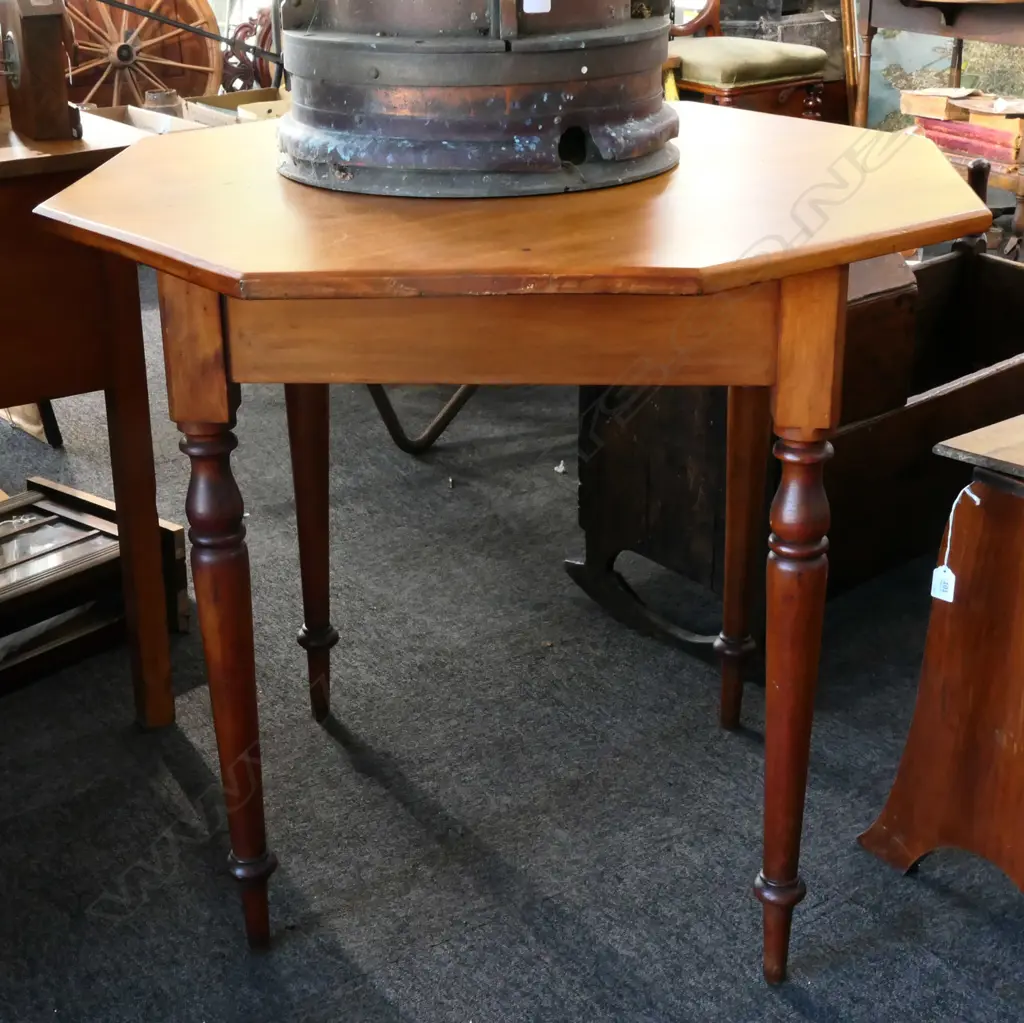 EDWARDIAN OCTAGONAL RIMU OCCASIONAL TABLE, ON TURNED TAPERING LEGS. Dia.850mm Image 1++