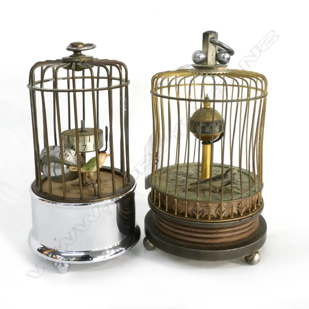 2 GERMAN CAGED BIRD 'SWING' CLOCKS (ONE CHROME, ONE BRASS) Image 1++