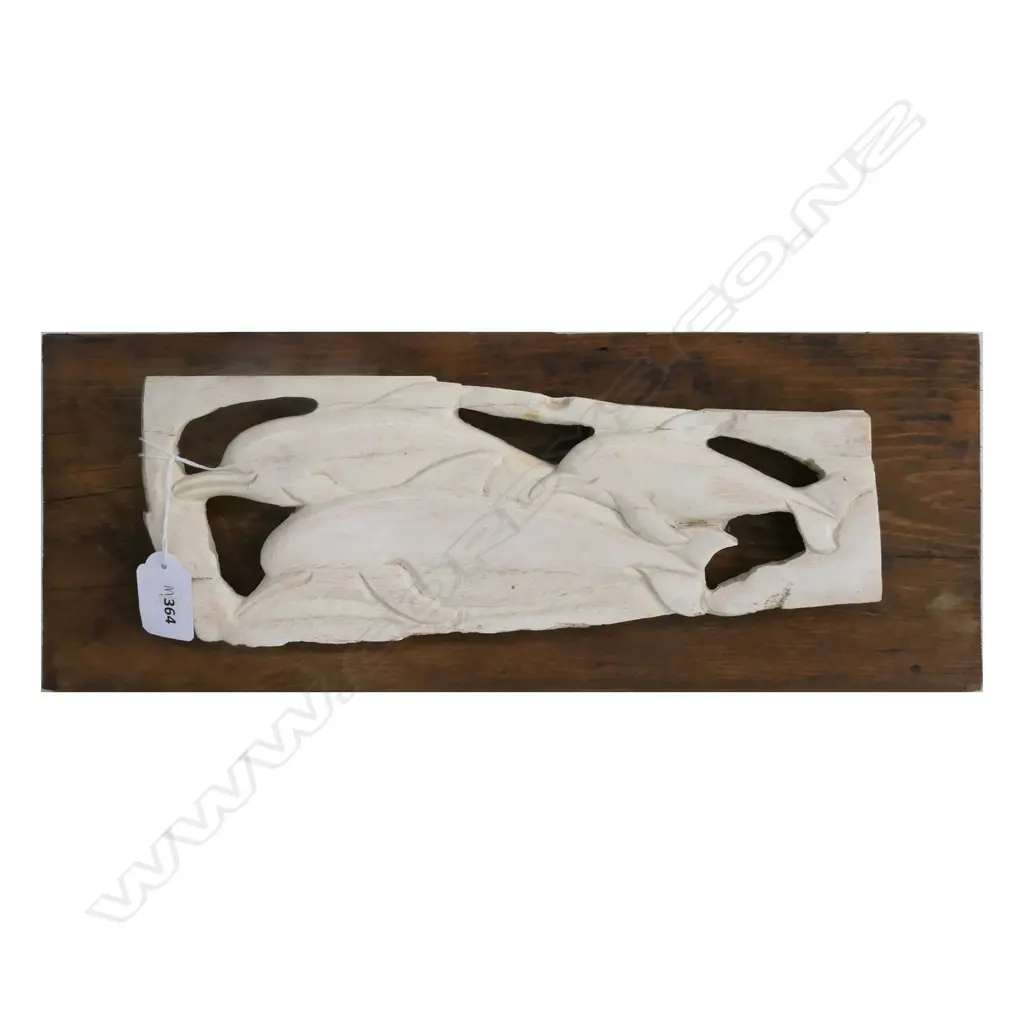 (M6) WHALEBONE SCULPTURE FEATURING THREE DOLPHIN ON WOODEN BACKING. L.400mm Image 1++