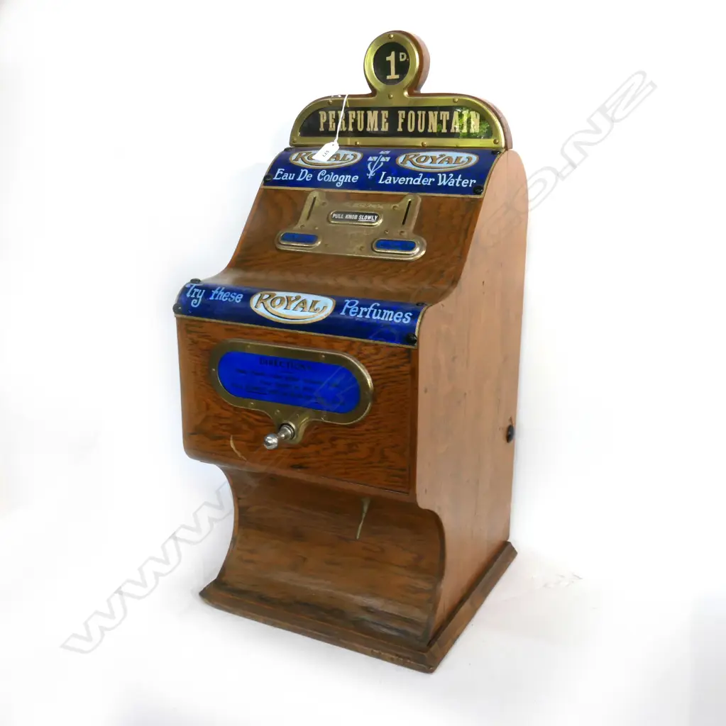 OAK CASD 'ROYAL' COIN OPERATED PERFUME DISPENSER. H.750mm Image 1++