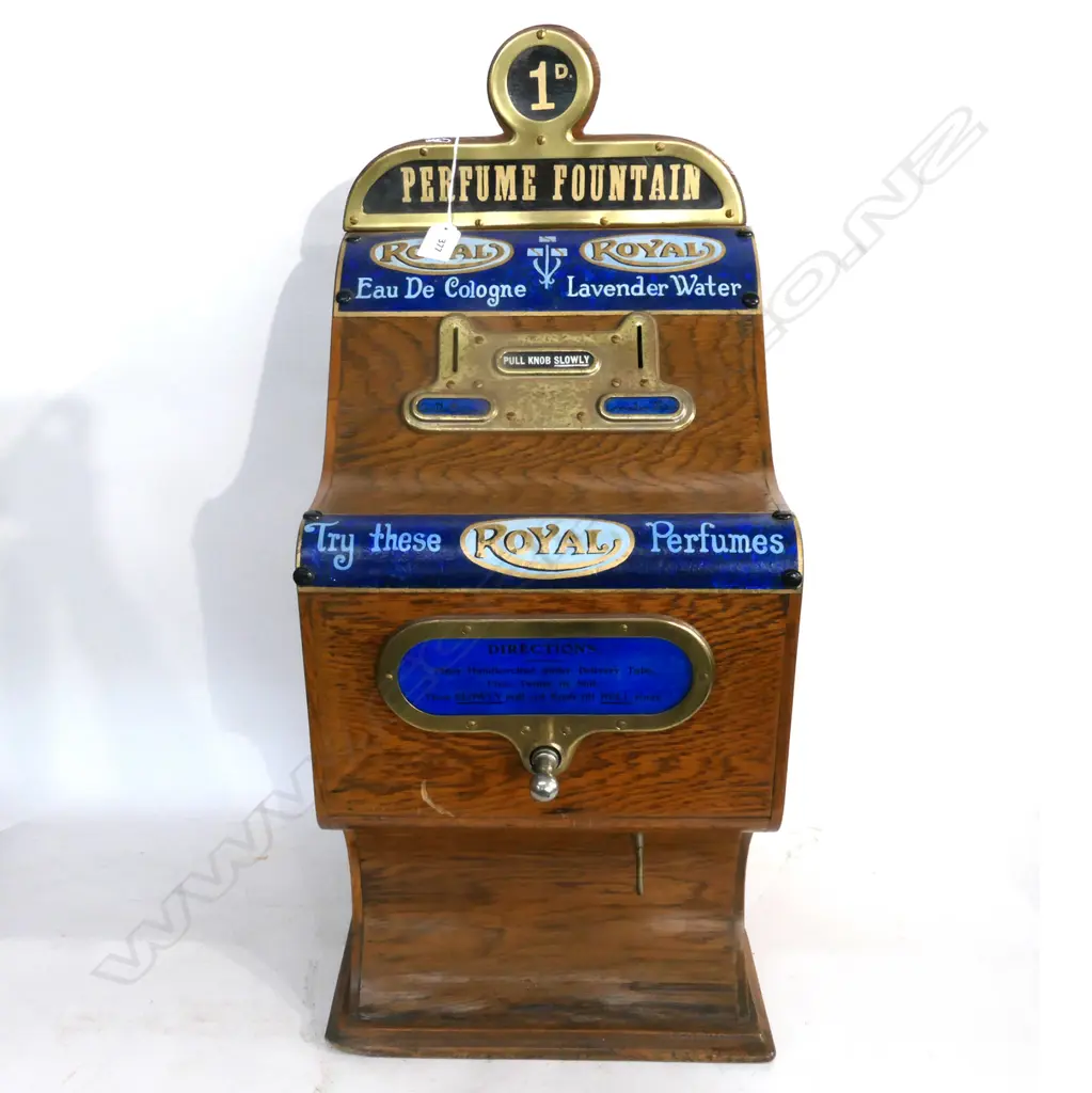 OAK CASD 'ROYAL' COIN OPERATED PERFUME DISPENSER. H.750mm Image 1++