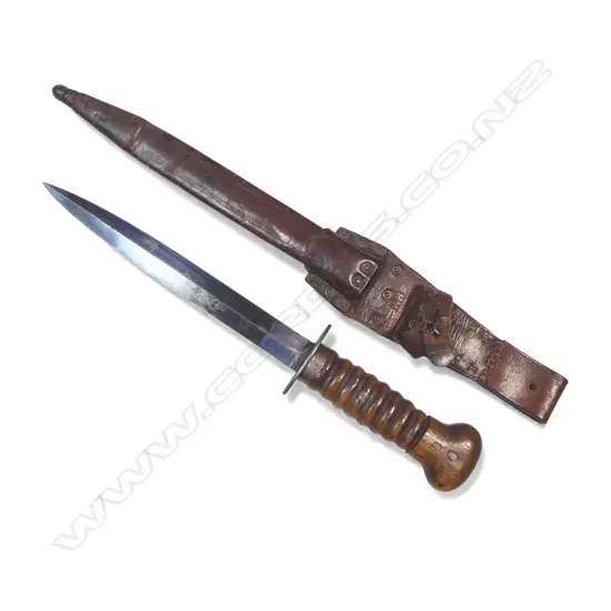 Dutch Stormdolk Model 1915 Commando Knife with a large wooden 8 groove handle with swollen pommel and two steel rivets,