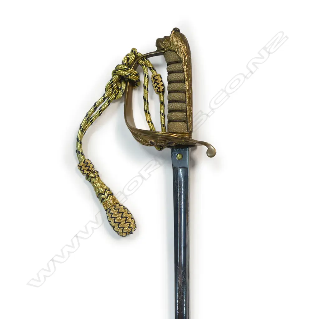 Royal Naval Reserve 1827 Pattern Officers Sword, 32 ½" narrow flat-back blade etched on the ricasso 'Gieves, Portsmouth, London, Edinburgh & Devonport'. Inset proof disc 'P'. Image 1++