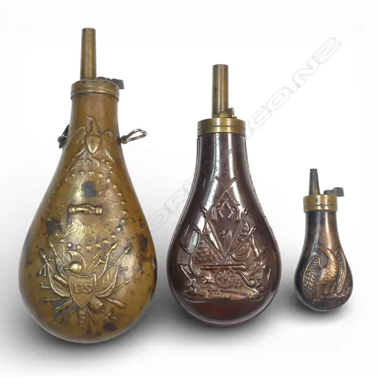 Three brass and copper replica powder flasks,