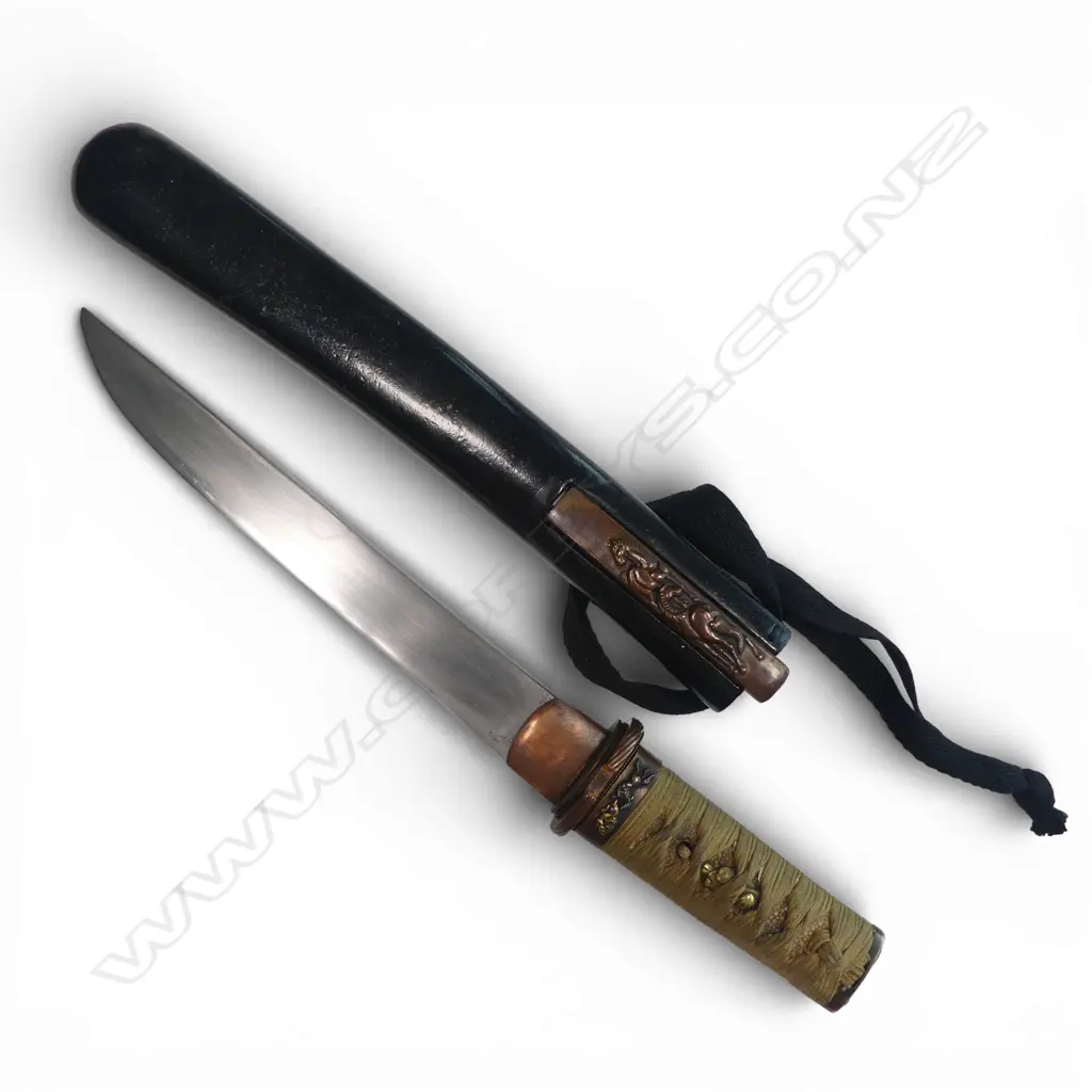 Japanese Tanto Blade of hirazukuri (flat side type) apparently signed Kabe Shige. Image 1++