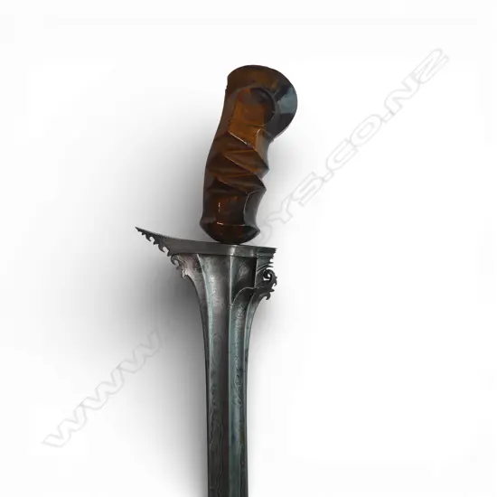 Impressive straight double edge bladed kris ("Maybe an executioner's kris"),