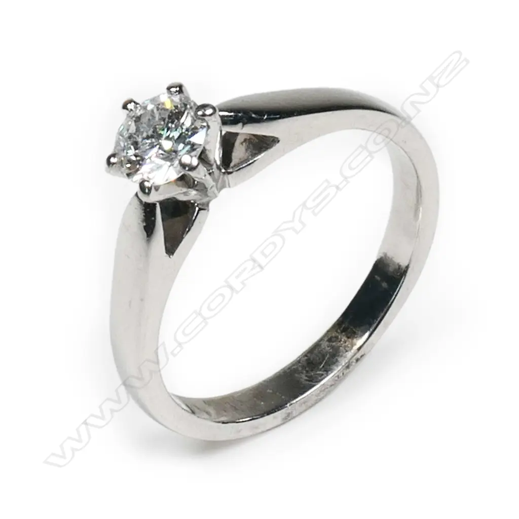 An 18ct white gold and diamond solitaire ring, Image 1++