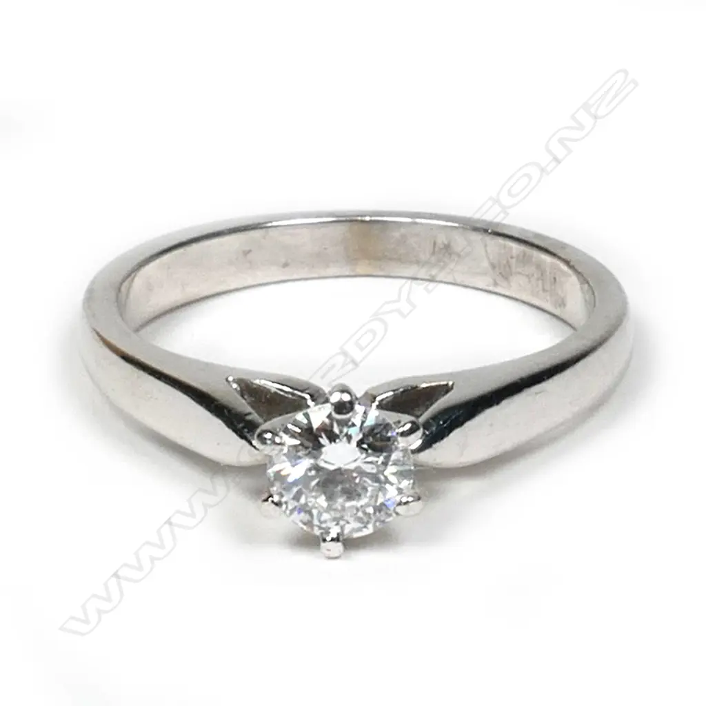 An 18ct white gold and diamond solitaire ring, Image 1++