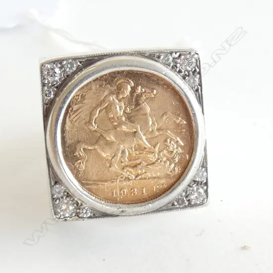 22CT GOLD FULL SOVEREIGN IN SILVER AND DIAMOND SET MOUNT (VAL)