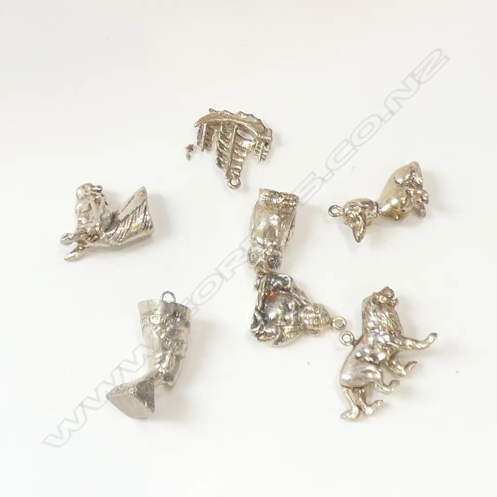 SEVEN SILVER CHARMS  Image 1++