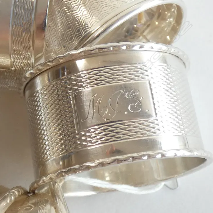 SIX ASST STG SILVER NAPKIN RINGS; TOTAL WEIGHT 101GMS Image 1++
