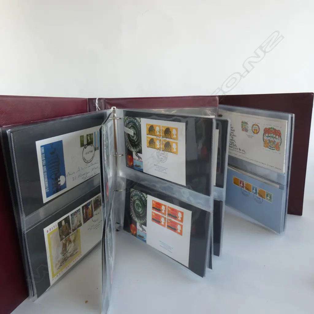 STAMPS; 2 ALBUMS OF GT BRITAIN AND NZ FIRST DAY COVERS Image 1++