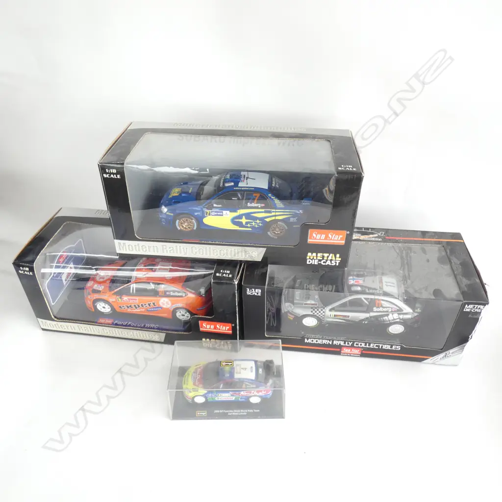 4 BOXED RALLY CAR MODELS; 3 SUN STAR L.360mm + BURAGO Image 1++