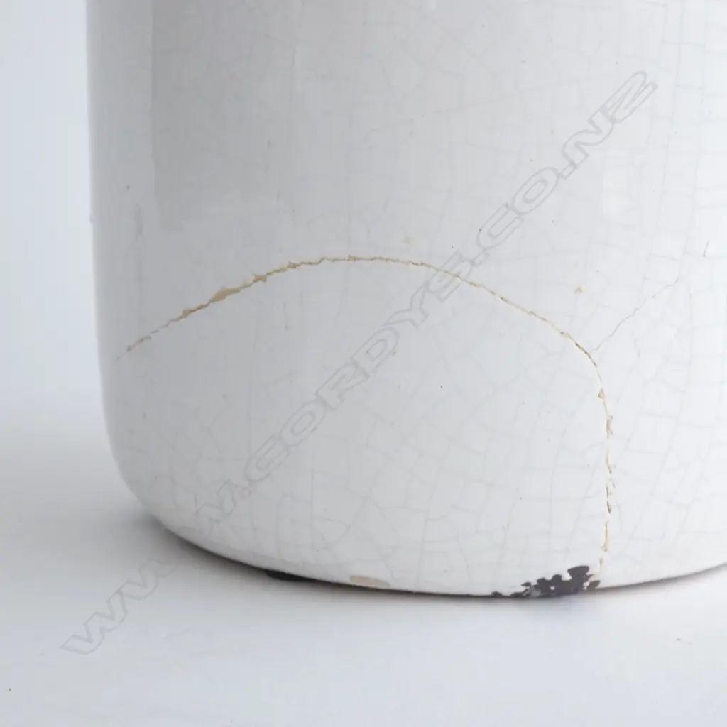 Smaller vase has repaired break Image 1++