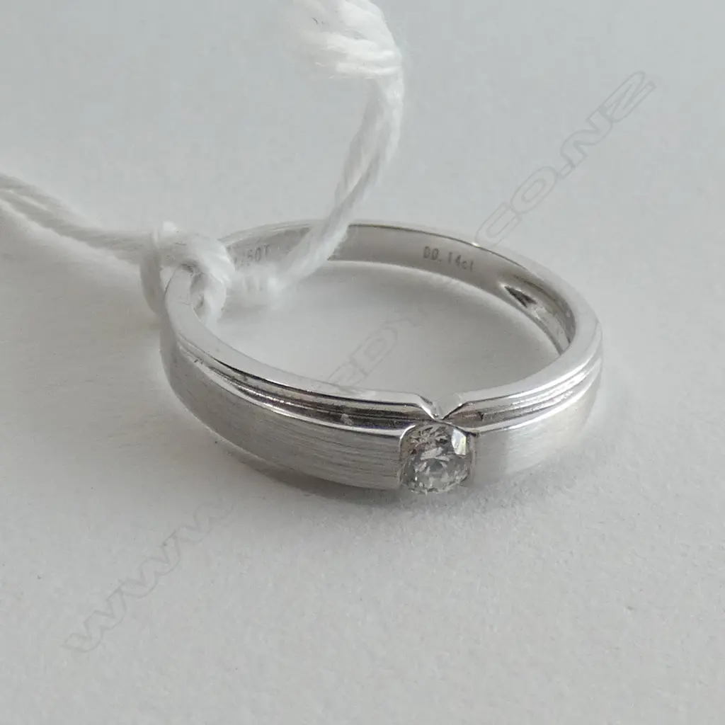 18CT WHITE GOLD AND DIAMOND SET BAND Image 1++