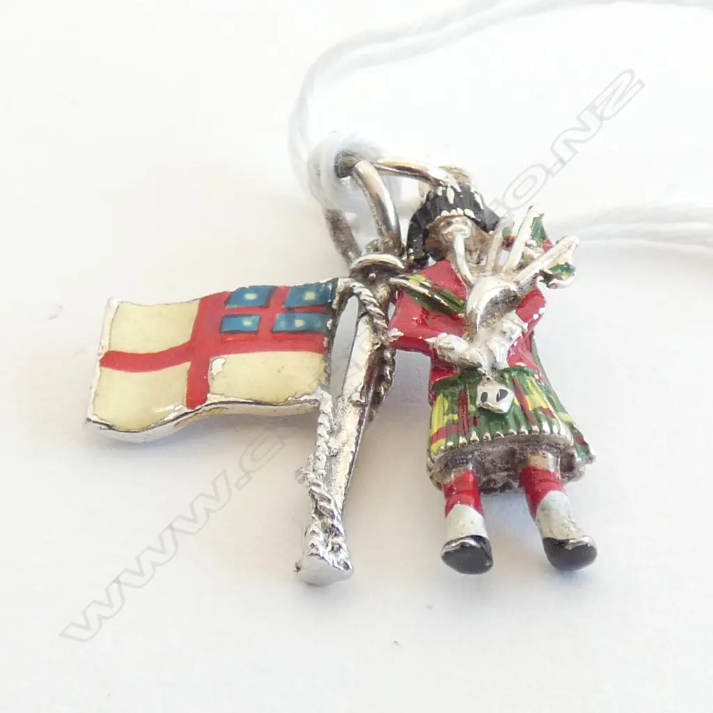TWO VINTAGE SILVER AND ENAMEL CHARMS Image 1++