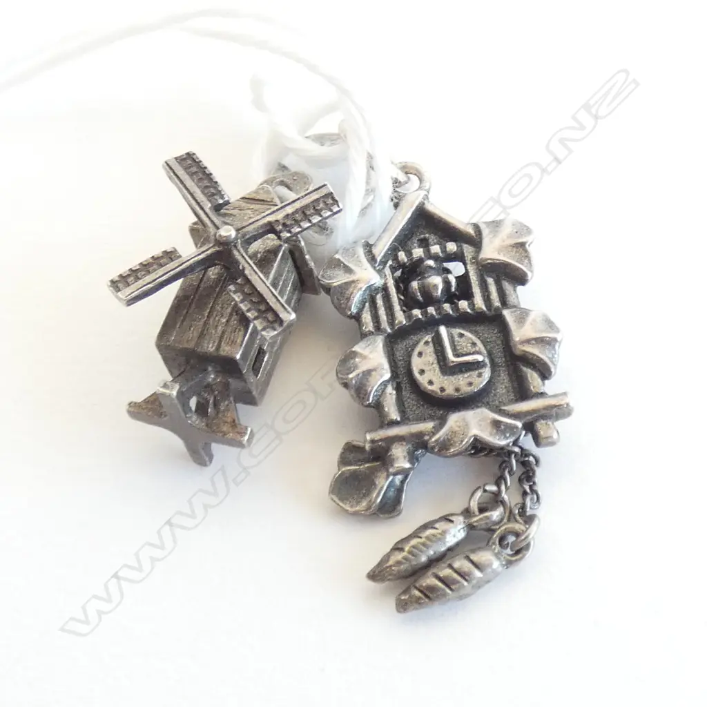 TWO VINTAGE SILVER CHARMS Image 1++