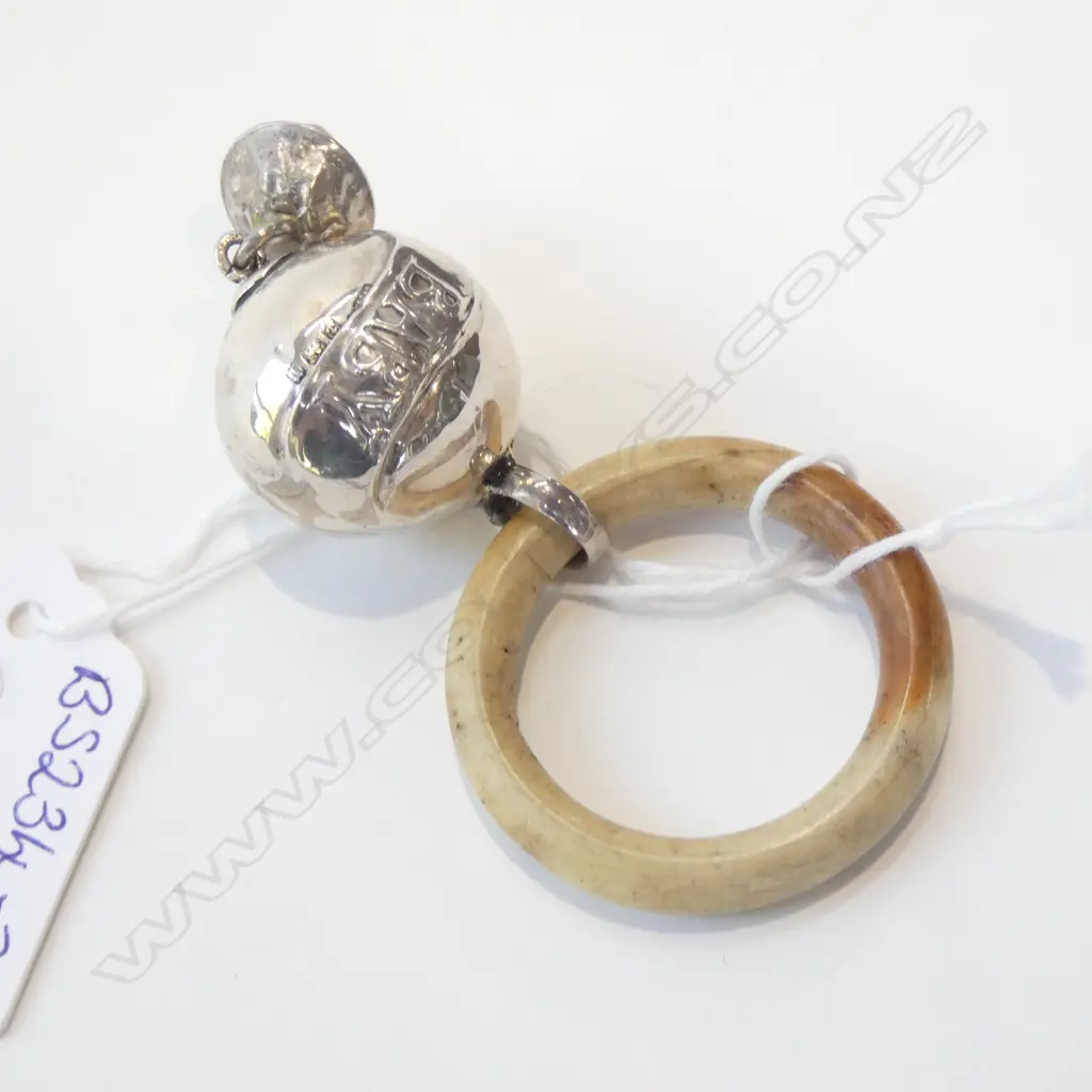 SILVER BABY RATTLE (BALL) 1 BELL WITH IVORINE RING Image 1++