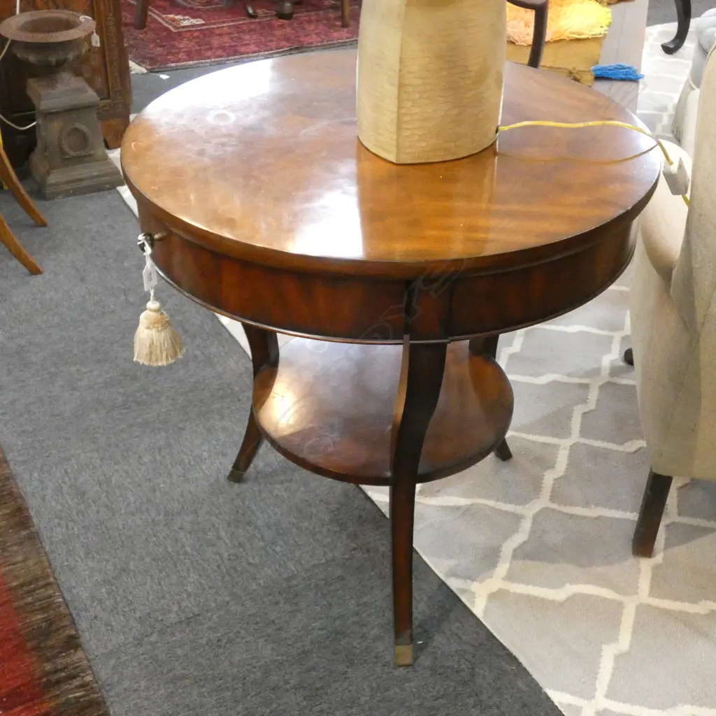 CIRCULAR MAHOGANY TABLE w. TASSELED KEY Image 1++