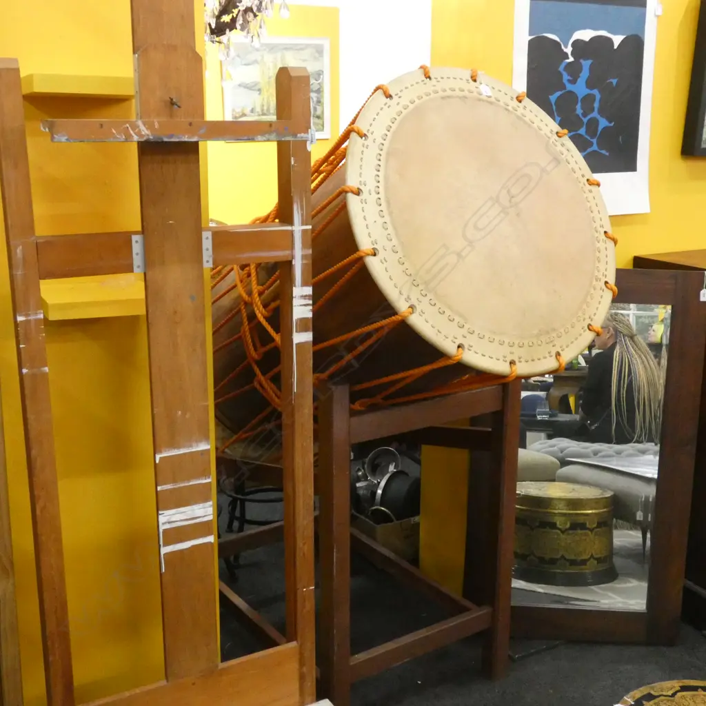 A large Taiko Drum on a hardwood stand Image 1++