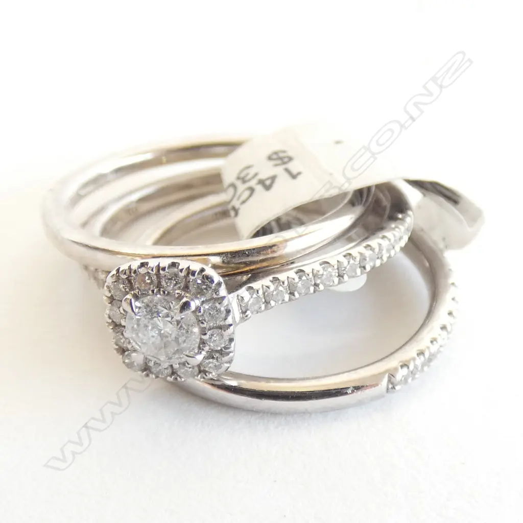 14CT WG CLUSTER RING SET, 1 X 22PT DIAM, 74 X 0.9PT, 6.3G Image 1++