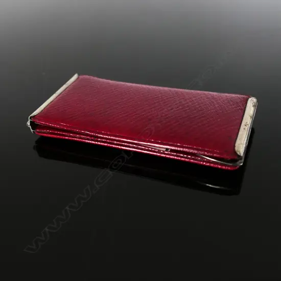 Leather Silver and Red Leather Case with three stamp compartments.