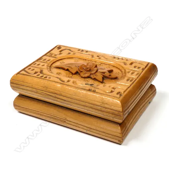 Wooden Single Stamp Box with a top carved with a floral motif.
