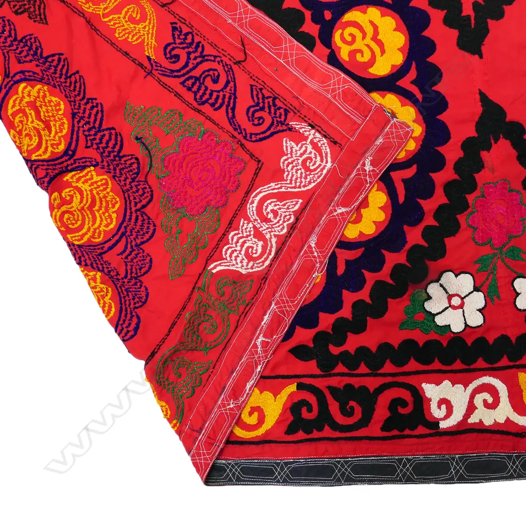 AN UZBEKISTANI SUZANI TEXTILE DECORATED WITH COLOURFUL CHAIN STITCH Image 1++
