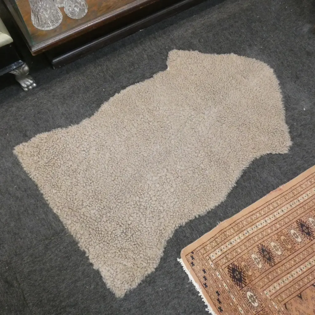 TAN CURLY HAIR GOAT HIDE RUG L. 1080MM Image 1++