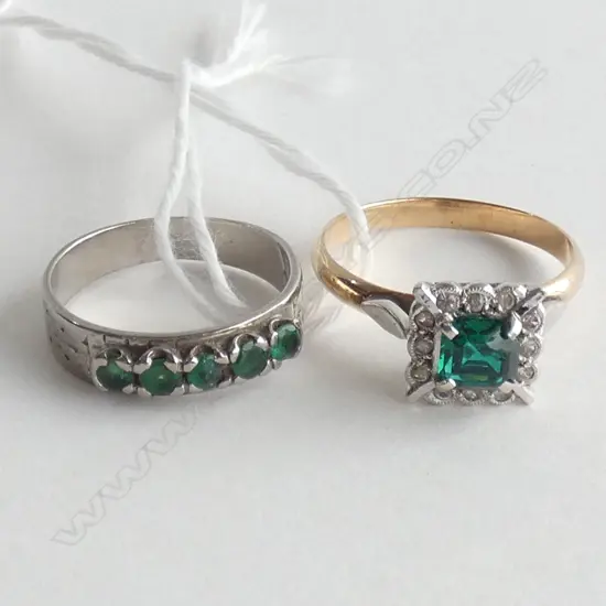 2 RINGS; 1 FAUX EMERALD / 1 EMERALD BAND 