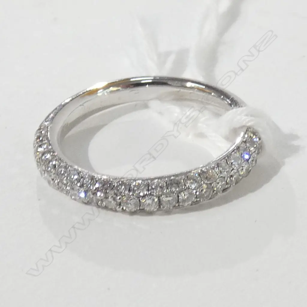 18CT WHITE GOLD AND PAVE SET DIAMOND BAND Image 1++