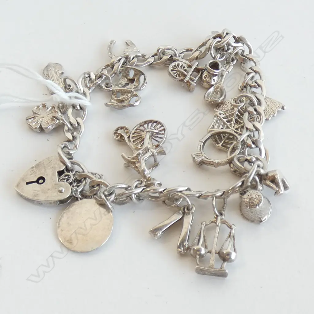 STG SILVER CHARM BRACELET 27 GRAMS Image 1++