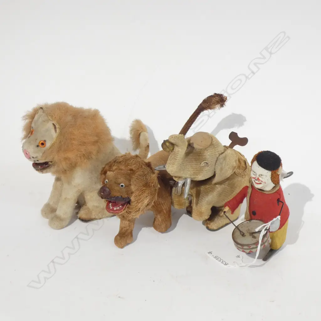 FOUR ANTIQUE WIND UP ANIMAL TOYS; ELEPHANT / TWO LIONS & MONKEY W DRUM  - ALL HAVE KEYS Image 1++