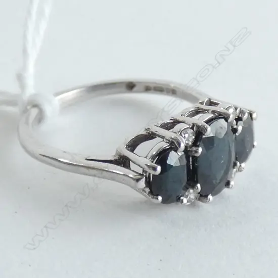 18CT WHITE GOLD SAPPHIRE AND DIAMOND RING