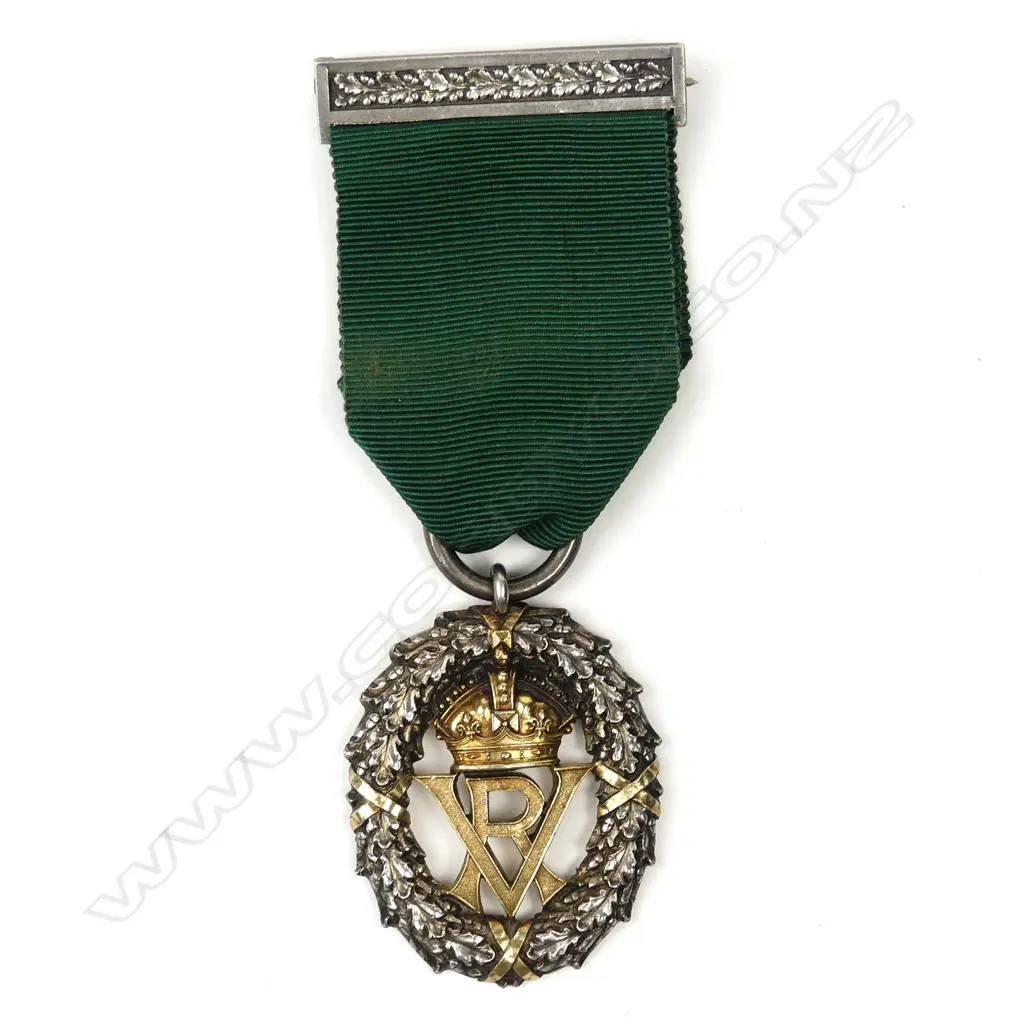 BRITISH MEDAL - VOLUNTEER DECORATION VR. 1898 WITH RIBBON AND PIN Image 1++