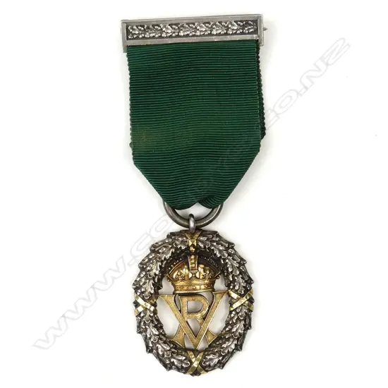 BRITISH MEDAL - VOLUNTEER DECORATION VR. 1898 WITH RIBBON AND PIN