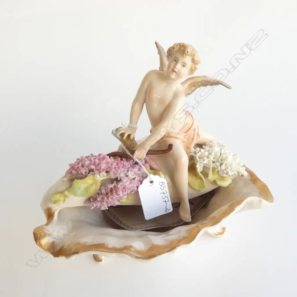 PLAUE, THURINGIA (GERMANY) GILDED PORCELAIN SHELL WITH FLOWERS & CHERUB. H.190mm MARKS TO BASE. WING CHIPPED Image 1++
