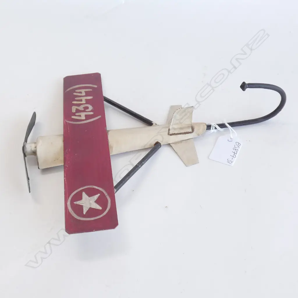 OLD TIN PLATE WAR PROPELLER PLANE WALL HOOK H. 260MM Image 1++